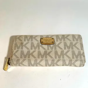 Michael Kors Monogrammed Jet Set Zip Wallet