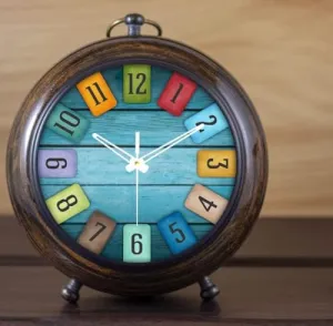 Multicolour Analog Table Clock with Wooden Frame, 15 cm Diameter Without Any Battery or Sell.
